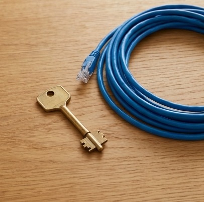 AI-generated editorial illustration: simple key and blue network cable.