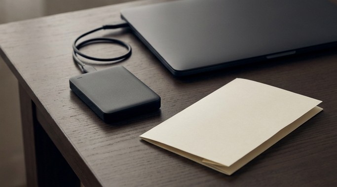 AI editorial illustration of a backup drive and review document