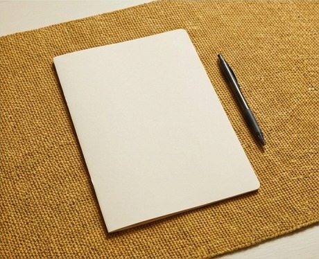 AI editorial photograph of recommendation folder and pen