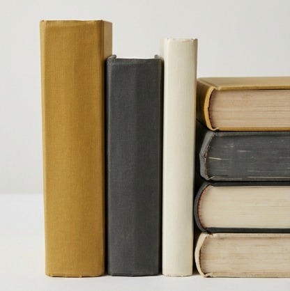AI editorial photograph of reference books with no titles