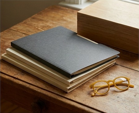 AI editorial photograph of organized archive folders