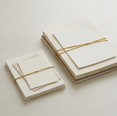 AI editorial photograph of small and large paper samples on desk