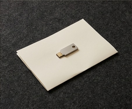 AI editorial photograph of security key beside blank checklist