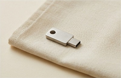 AI illustration of an unbranded hardware security key