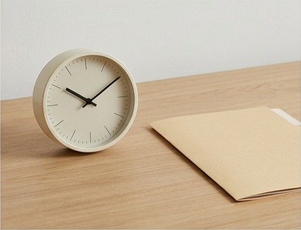 AI illustration of a clock beside a support folder