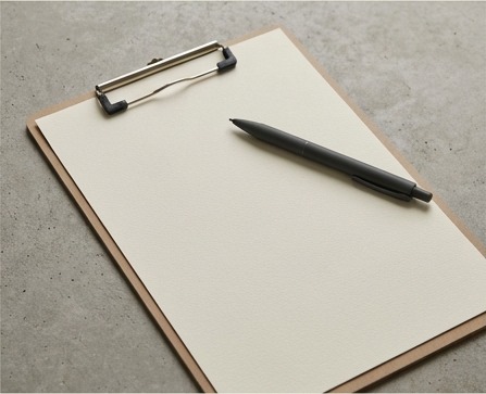 AI editorial photograph of blank verification sheet and pen